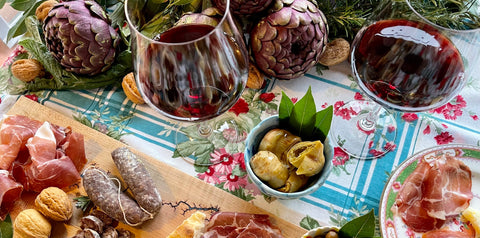 Italian wine and charcuterie arranged on the table